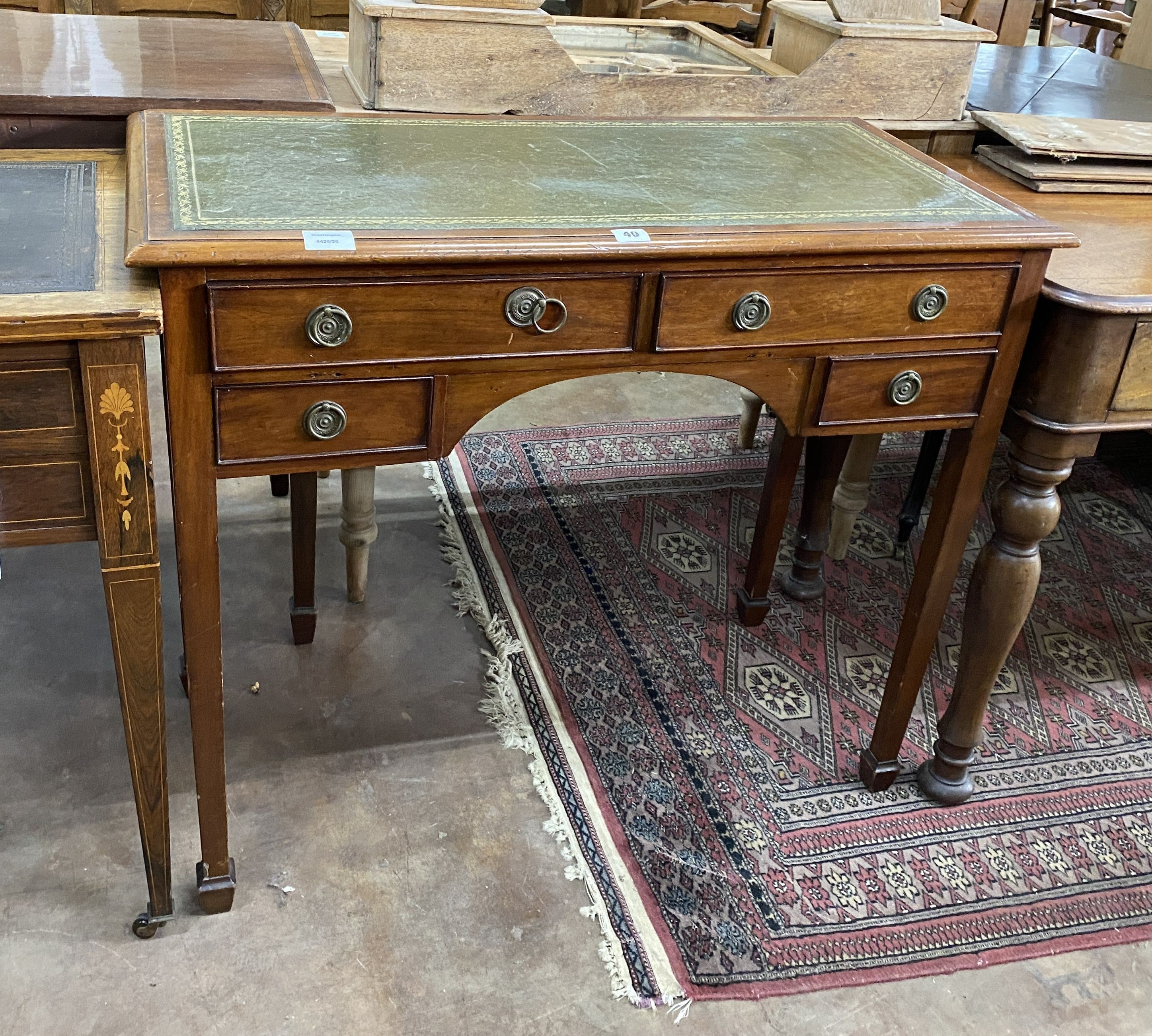 A George III mahogany kneehole writing table, width 89cm, depth 42cm, height 76cm